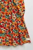 Bottom skirt of a fall colored floral dress