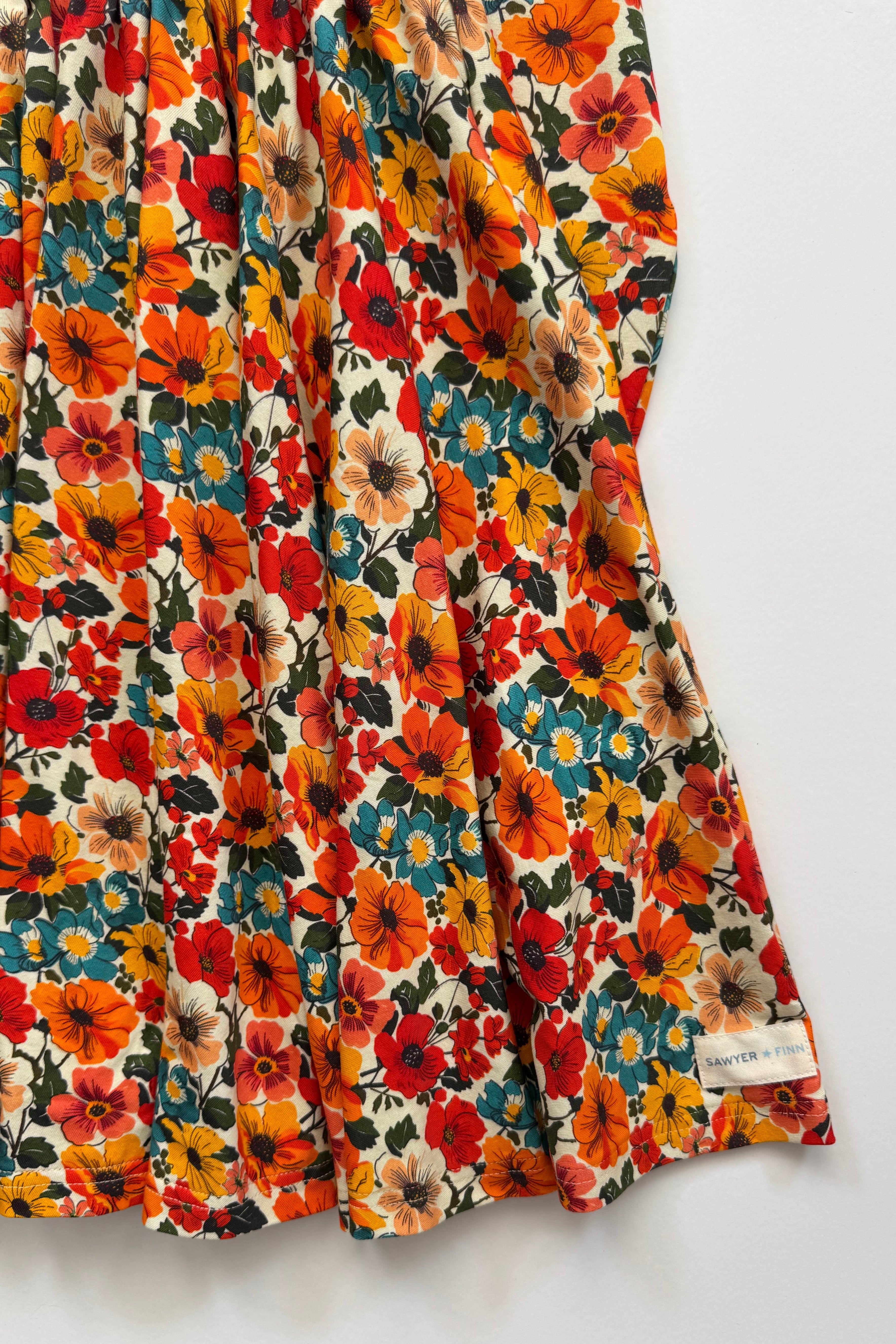 Bottom skirt of a fall colored floral dress